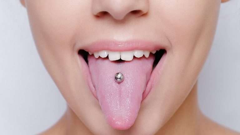 piercing lingua denti